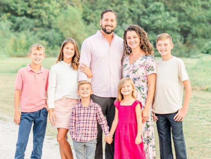 KJ Smith with his wife and five children